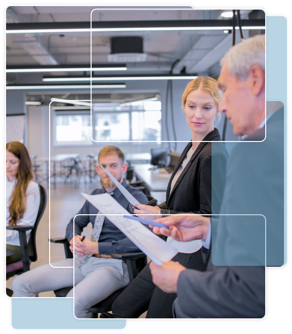 Businessperson presenting documents to colleagues