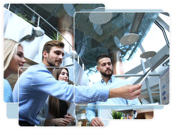 Person pointing at screen while others watch attentively
